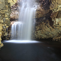 Buy canvas prints of Smoo Cave Waterfall by Maria Gaellman