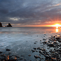 Buy canvas prints of Talisker Bay and Spikes from the setting Sun by Maria Gaellman