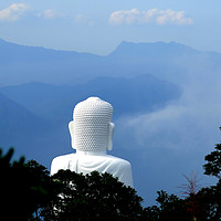 Buy canvas prints of BUDDHA IN THE MIST by Jacque Mckenzie
