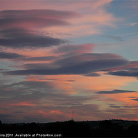 Buy canvas prints of Lenticular Sunset by Ian Collins