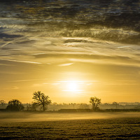 Buy canvas prints of Misty Sunrise by Ian Collins