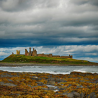 Buy canvas prints of Dunstanburgh Castle on a blustery day by Angela Wallace