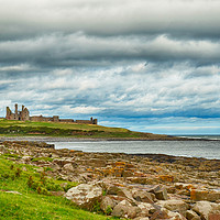 Buy canvas prints of Dunstanbrugh Castle No 2 on a blustery day  by Angela Wallace