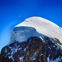 Buy canvas prints of Paragliding at the Mtterhorn by Angela Wallace