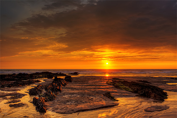 Setting sun at Croyde Bay Picture Board by Dave Wilkinson North Devon Ph