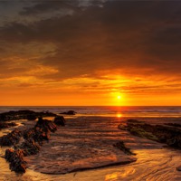Buy canvas prints of Setting sun at Croyde Bay by Dave Wilkinson North Devon Ph