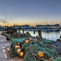 Buy canvas prints of Fishing nets Ilfracombe Harbour by Dave Wilkinson North Devon Ph
