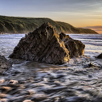 Buy canvas prints of Putsborough Rock Sunset by Dave Wilkinson North Devon Ph