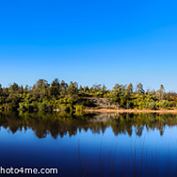 Buy canvas prints of Lake reflections panorama by Colin Chipp