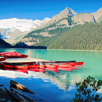 Buy canvas prints of Canoes on Lake Louise by Colin Chipp