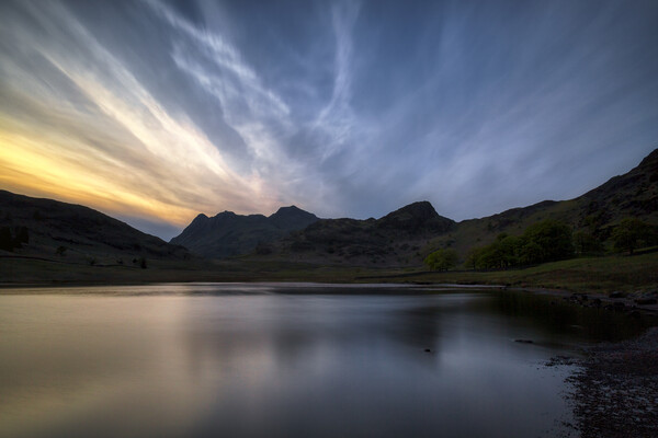 Langdale Pikes and Blea Tarn at Sunset Picture Board by Derek Beattie