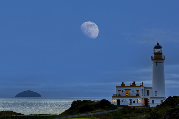 Moonset over Turnberry Lighthouse and Ailsa Craig Picture Board by Derek Beattie