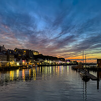 Buy canvas prints of Whitby Harbour Sunset Reflections by Derek Beattie