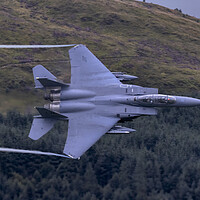Buy canvas prints of F15E Strike Eagle Low Level Mach Loop by Derek Beattie