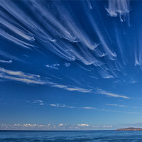 Buy canvas prints of Cirrus Clouds over Cape Wrath  by Derek Beattie