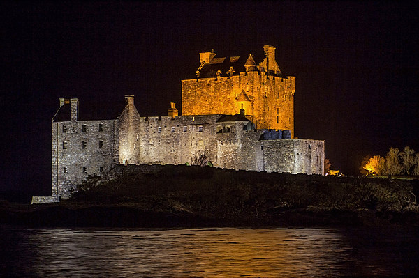 Eilean Donan Castle at Night Picture Board by Derek Beattie
