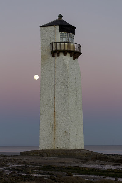 Southerness Lighthouse at Moonrise Picture Board by Derek Beattie