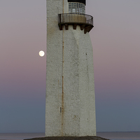 Buy canvas prints of Southerness Lighthouse at Moonrise by Derek Beattie
