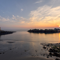 Buy canvas prints of Sunset at Portpatrick by Derek Beattie