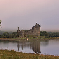 Buy canvas prints of Kilchurn Castle at Dawn by Derek Beattie