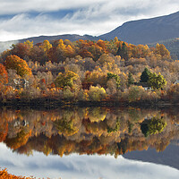 Buy canvas prints of Autumn Reflections on Loch Garry by Derek Beattie