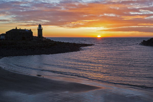 Sunset Portpatrick Lighthouse Picture Board by Derek Beattie