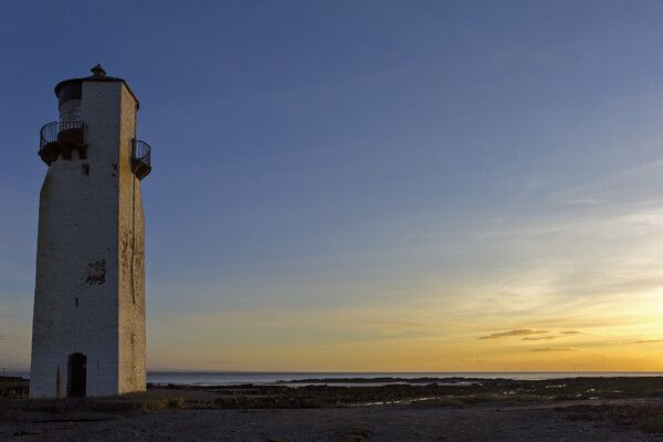 Southerness Lighthouse at Sunset Picture Board by Derek Beattie