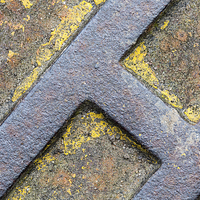 Buy canvas prints of Man Hole Cover H by Natalie Kinnear
