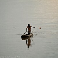 Buy canvas prints of Tribesman fishing on the Luangwa river Zambia by steve akerman