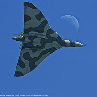 Buy canvas prints of Vulcan bomber over Hastings by steve akerman