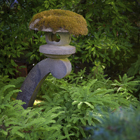Buy canvas prints of Japanese garden statue by Mark Harrop