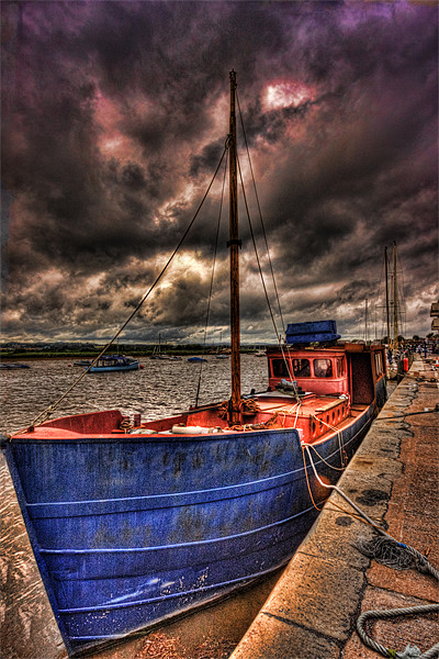 Old Boat in a storm Picture Board by Dean Messenger