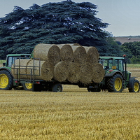 Buy canvas prints of  Gathering the hay bales by Dean Messenger