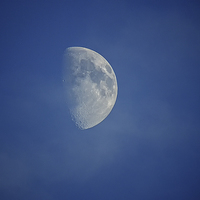 Buy canvas prints of  the Moon and the clouds by Dean Messenger