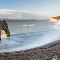Buy canvas prints of In the Shadow of Durdle Door by Chris Frost