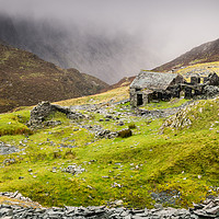 Buy canvas prints of Feeling the weather at Dubs Hut by John Dunbar