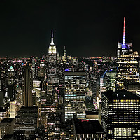 Buy canvas prints of Manhattan At Night by Phil Clements