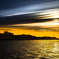 Buy canvas prints of Bamburgh Castle Sunset by Philip Male