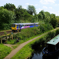 Buy canvas prints of Rail and Canal by Alan Kirkby