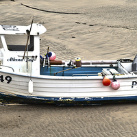 Buy canvas prints of Small Fishing Boat by Colin Daniels