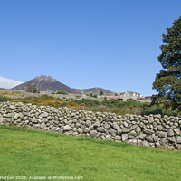 Buy canvas prints of A dry stone wall and mountain peaks n the world fa by Michael Harper