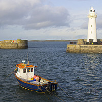Buy canvas prints of The lighthouse at Donaghadee Harbour by Michael Harper