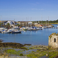 Buy canvas prints of A small medieval stone tower at Ardglass Harbour by Michael Harper