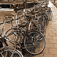 Buy canvas prints of Bike Parking -- Amsterdam in November SEPIA by Mark Sellers