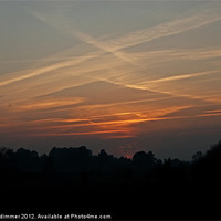 Buy canvas prints of Contrails over New Forest by Gordon Dimmer
