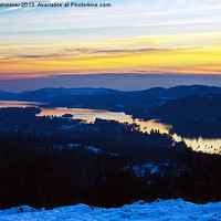 Buy canvas prints of low sun over snowy windermere by Gordon Dimmer