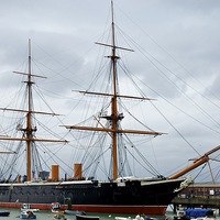 Buy canvas prints of HMS Warrior at Portsmouth by Gordon Dimmer