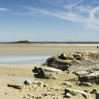Buy canvas prints of  Rocky outcrop near Mont St Michel in Normandy Fra by Gordon Dimmer