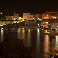 Buy canvas prints of  A close view of Tenby harbour at night by Gordon Dimmer