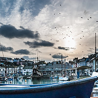 Buy canvas prints of The Sun going down at Brixham Harbour by Gordon Dimmer
